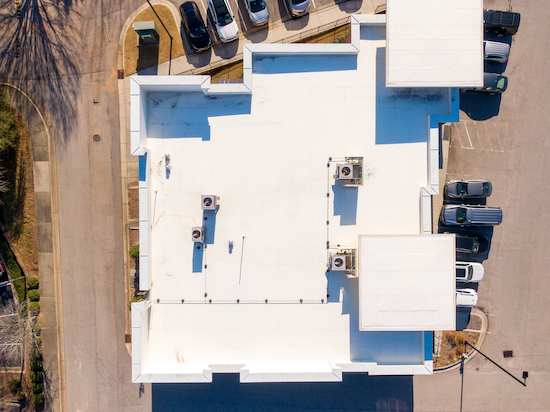 Drone view of a commercial flat roof