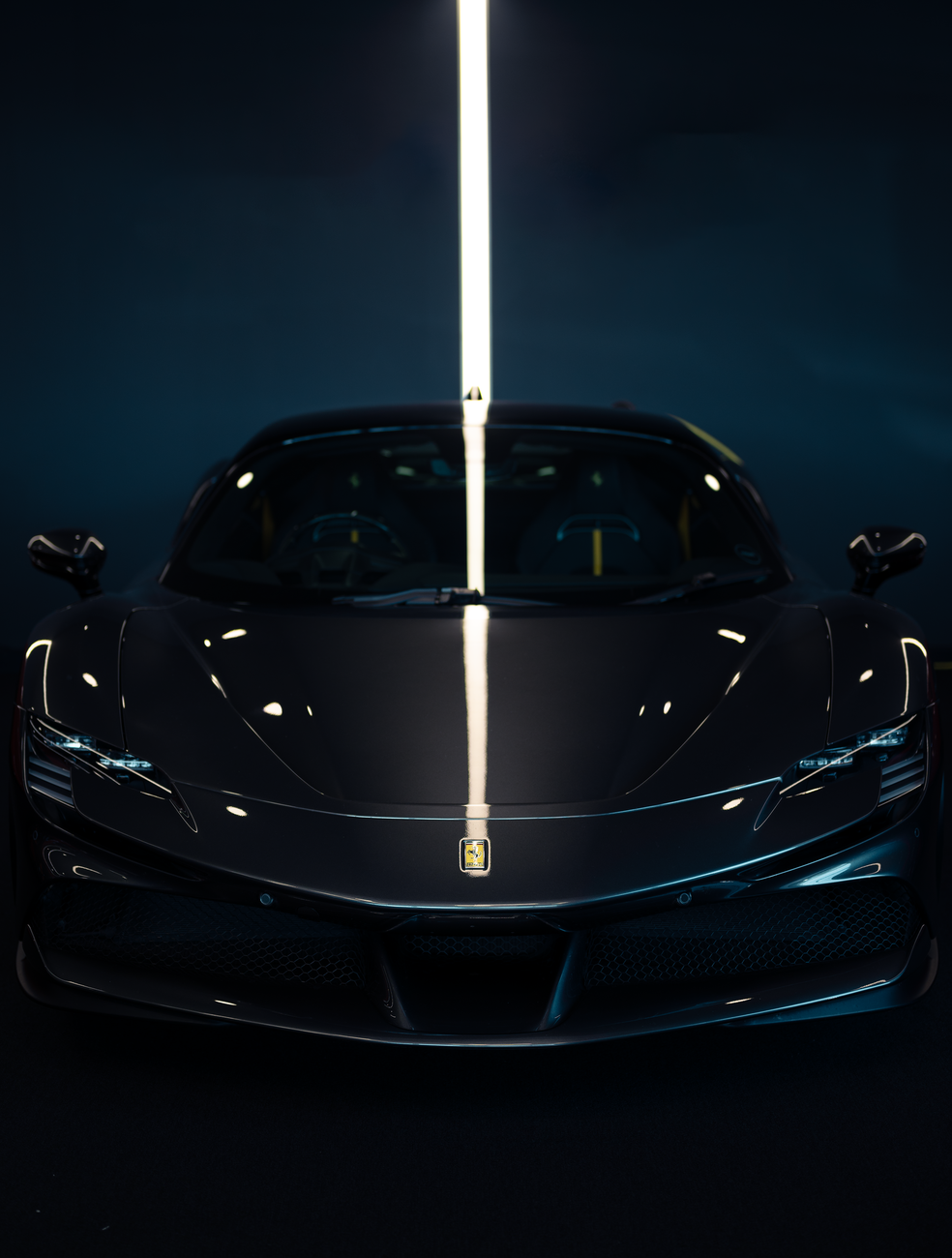 Freshly detailed sports car under studio light