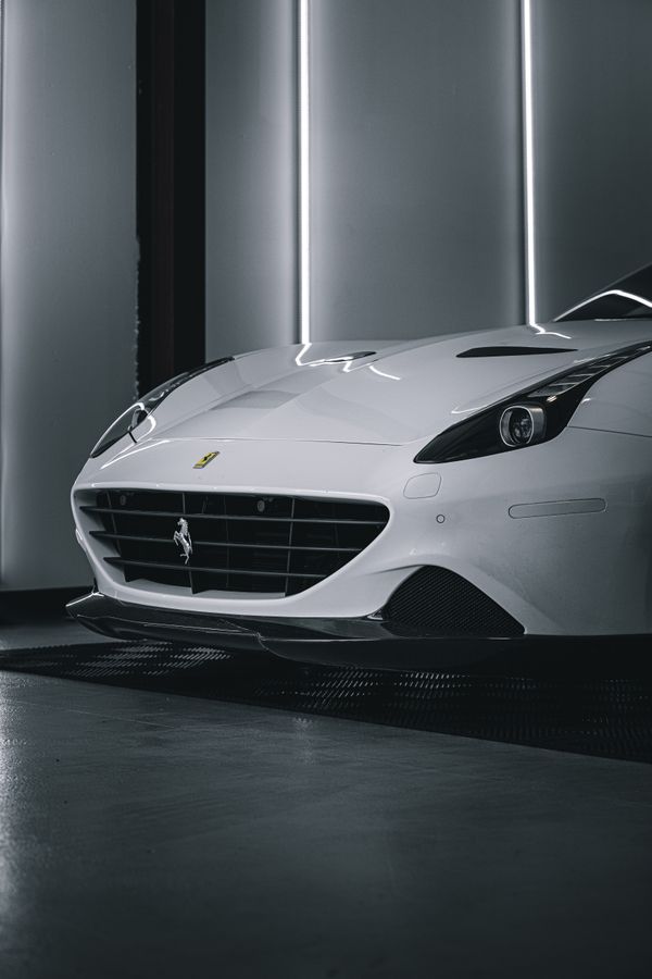 White sports car with fresh ceramic coating in the studio