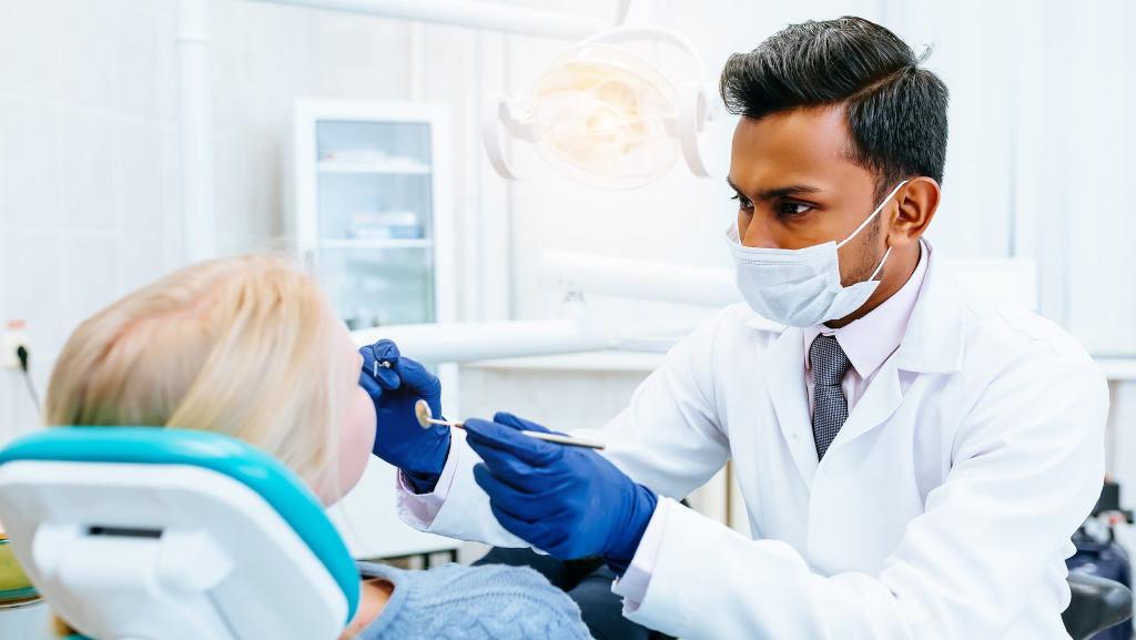 Dentist with patient