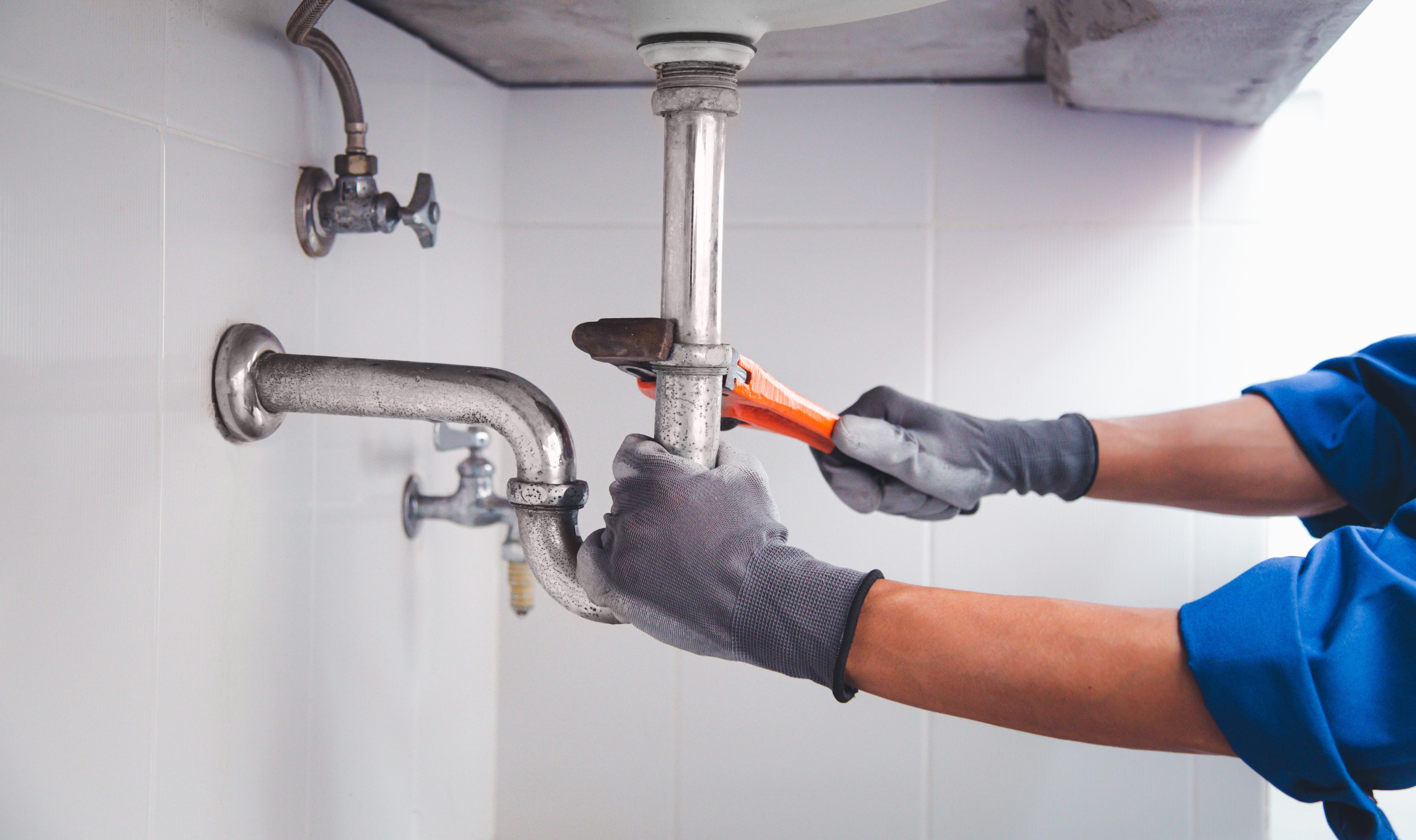 Plumbing technician at work