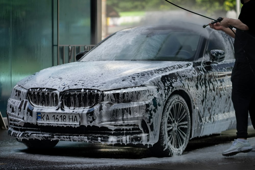 Car in foam during a mobile wash