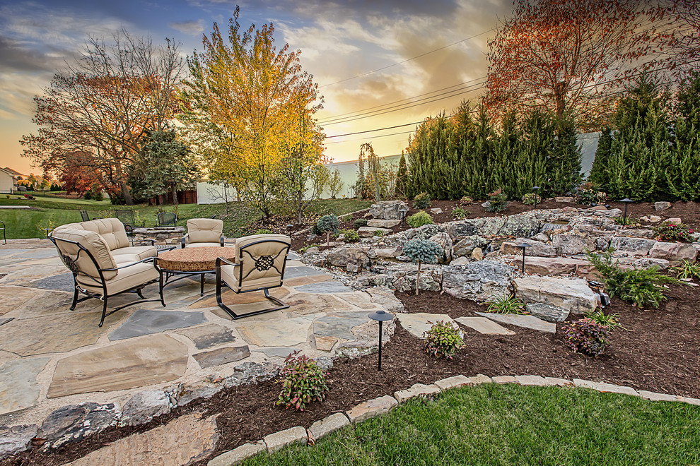 Stone patio with fire pit area (illustrative stock photo)