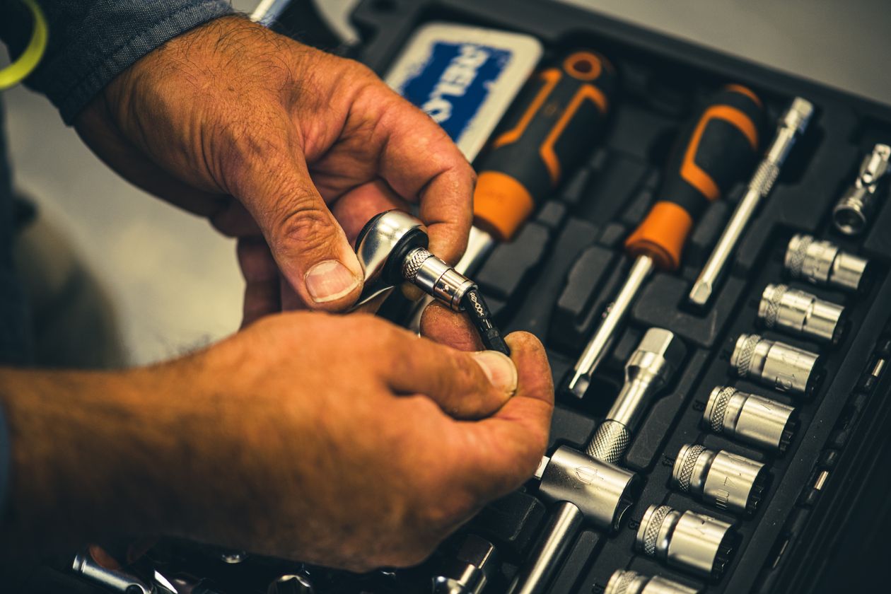 Hands fitting a socket