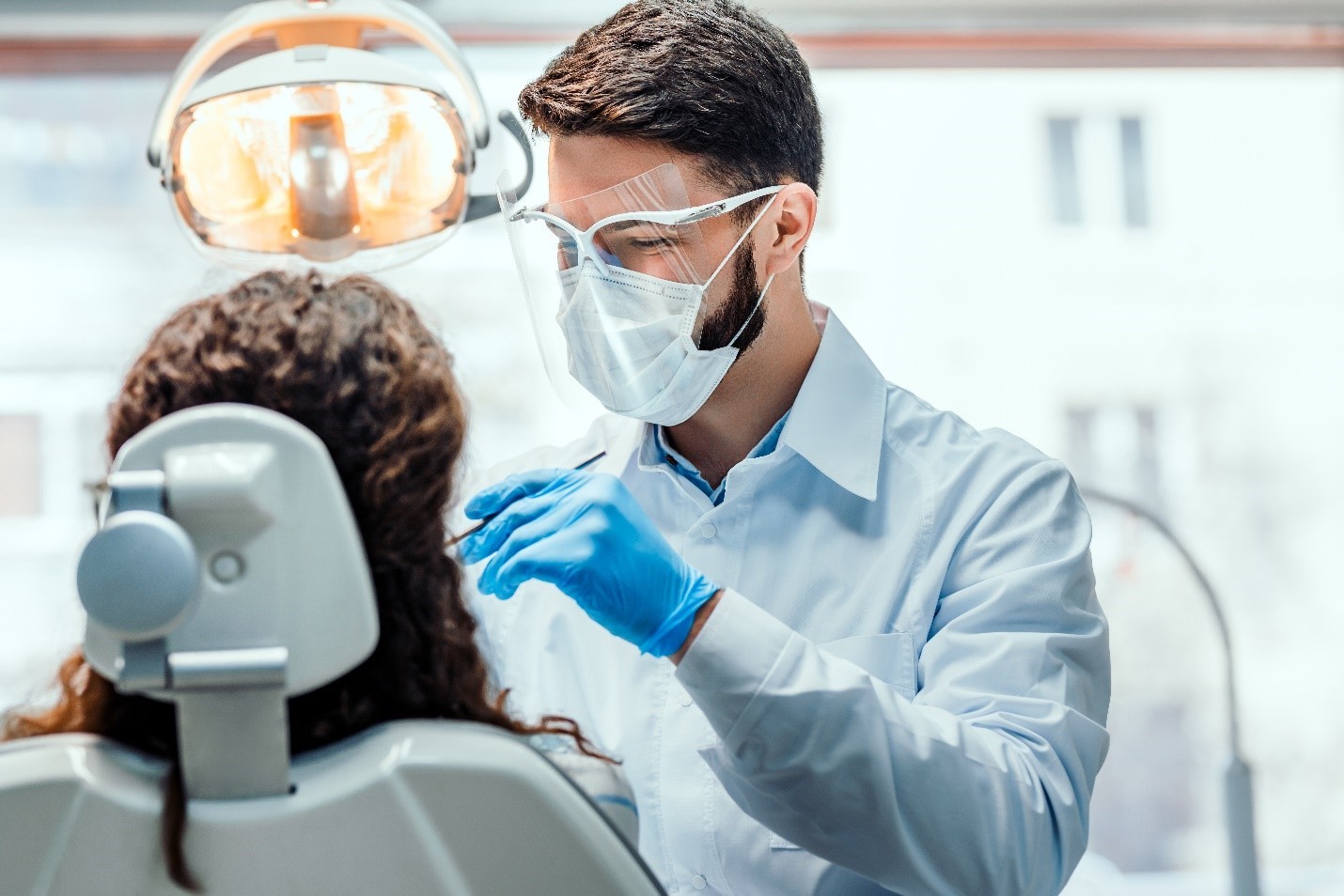 A dentist providing gentle treatment at East Adelaide Dental Studio