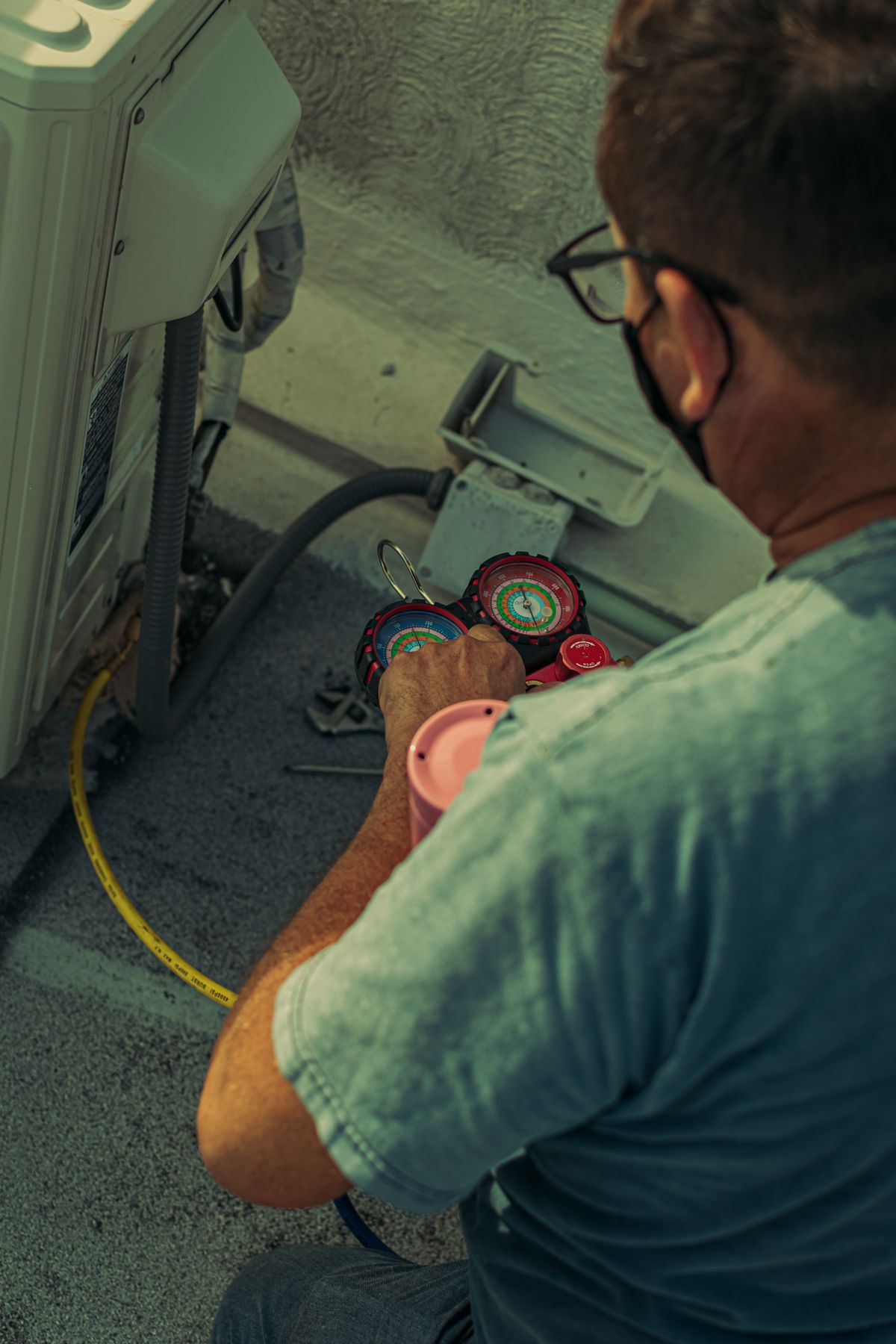 Emergency Master technician checking an HVAC system