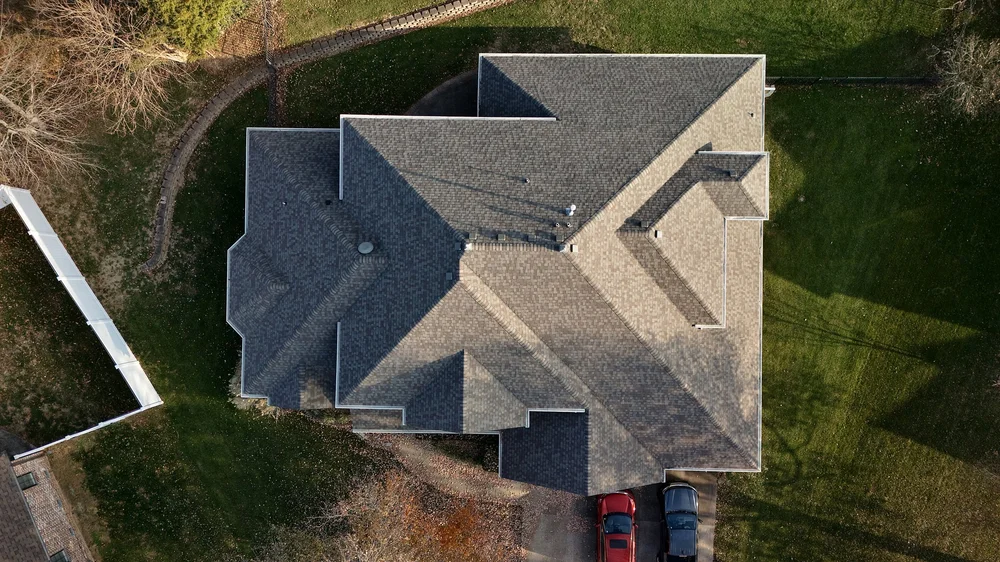 Aerial view of a new shingle roof on a Calgary home