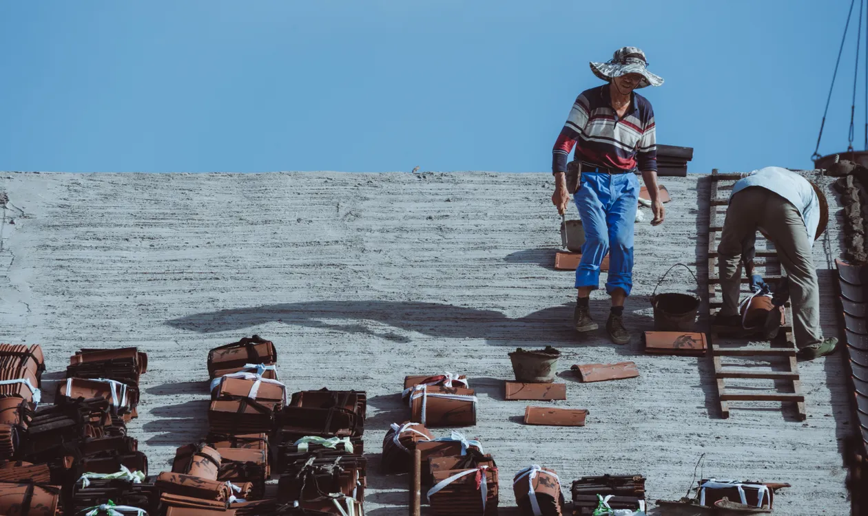 Roofer working at height