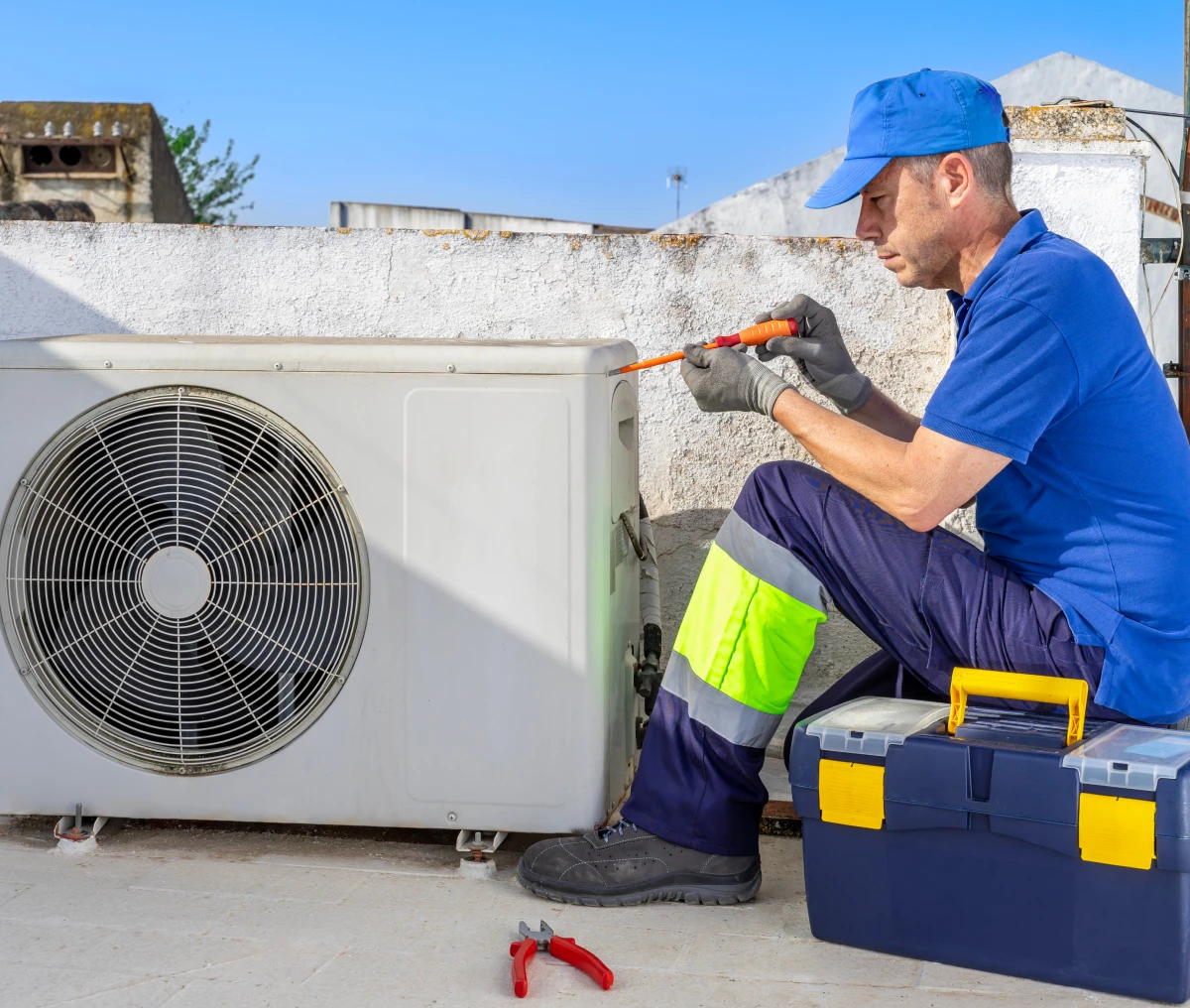 HVAC technician inspecting equipment