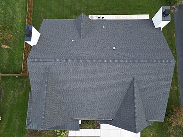 Aerial view of a finished shingle roof in Calgary