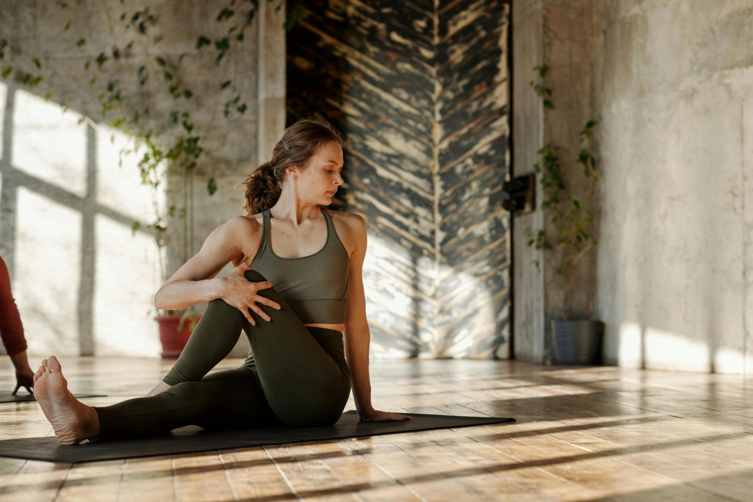 Thumbnail: seated yoga twist in a sunlit studio