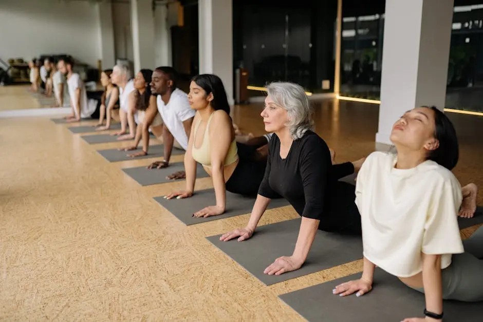 Thumbnail: group yoga class in cobra pose