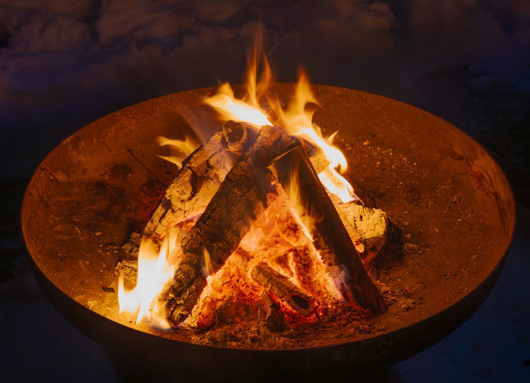 Sample image — a firepit glowing at dusk (stock photo)
