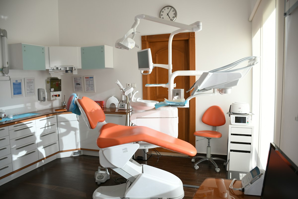 Modern dental treatment room with comfortable chair