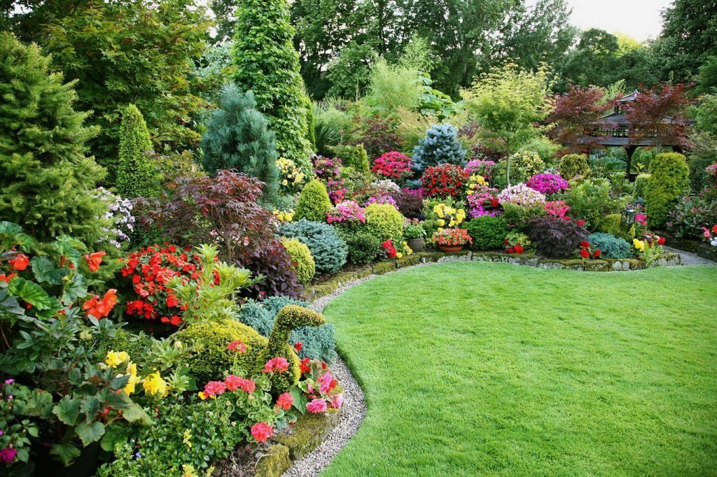 Flowering garden border with lawn in a residential landscape