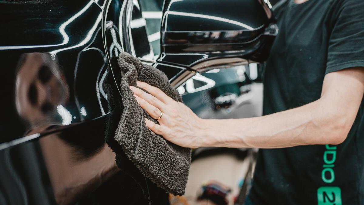 Hand-finishing a panel with a microfiber towel