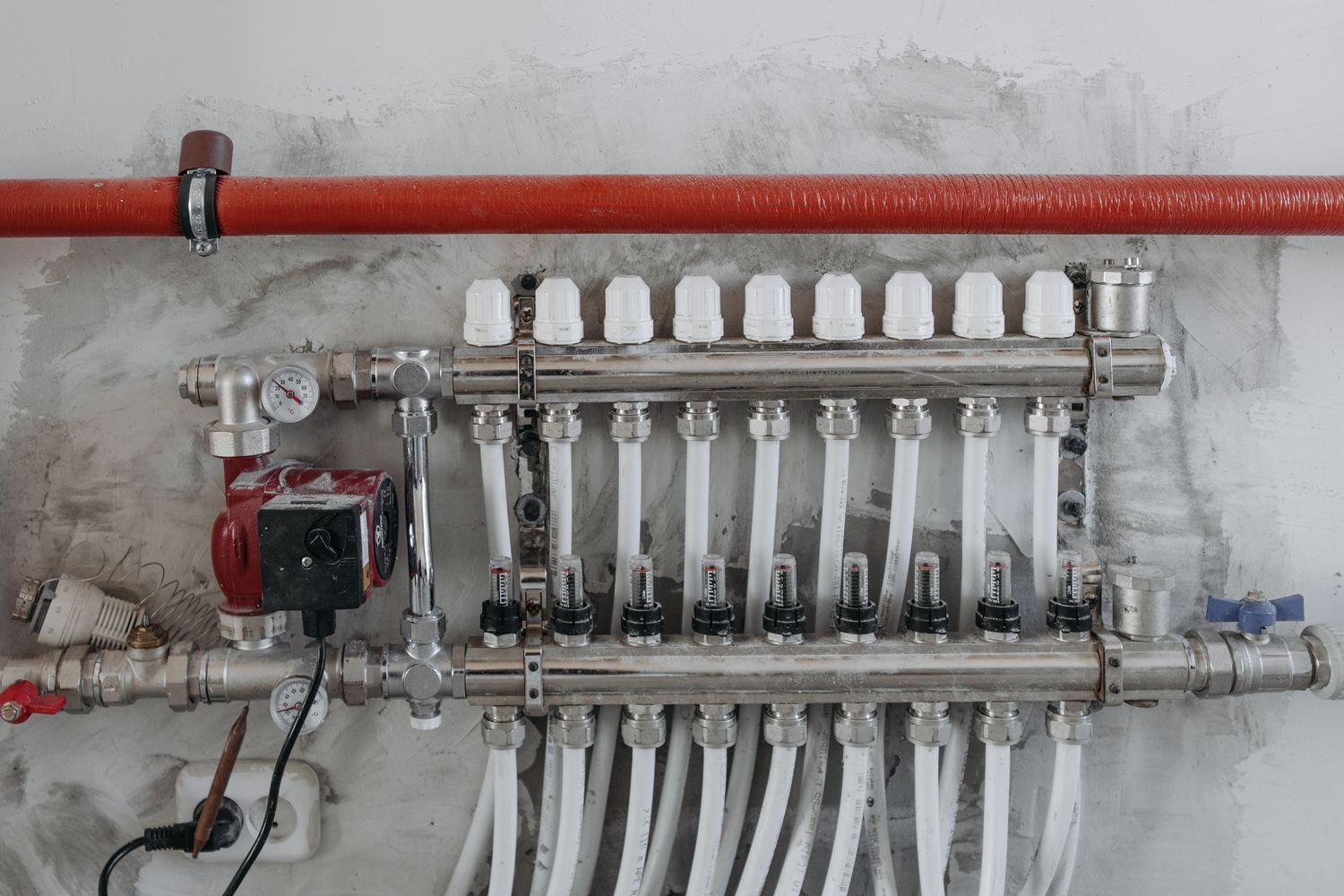 Neatly installed plumbing manifold with pressure gauges in a Marysville home