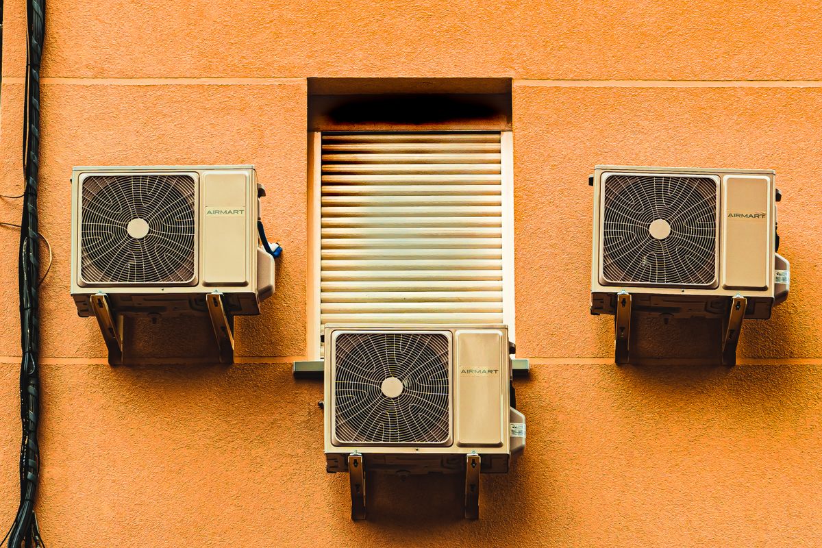 Wall-mounted air-conditioning units (illustrative stock photo)