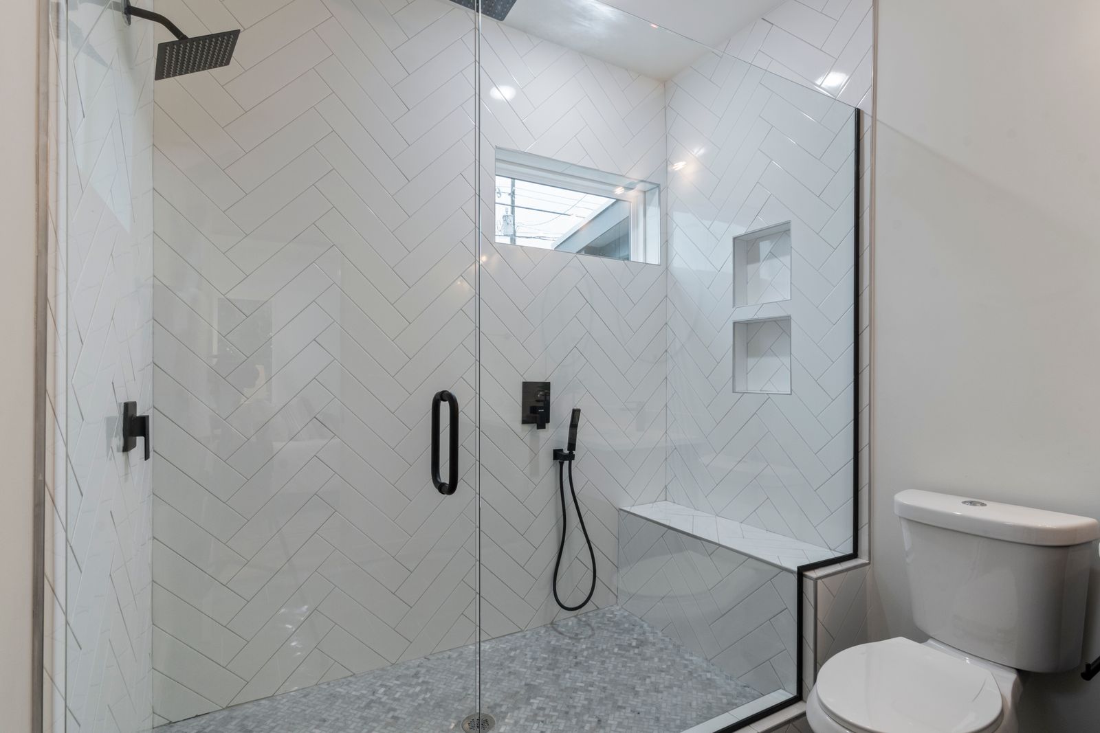 Walk-in shower with herringbone tile, Seattle