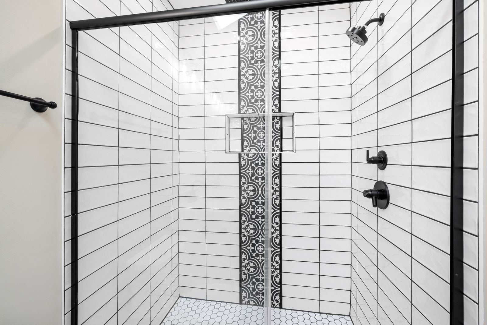 Shower with subway tile installed during a bathroom remodel in Seattle