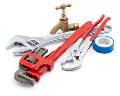 Plumbing tools laid out for a job