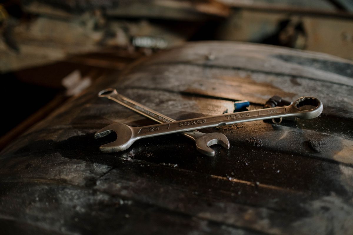 Plumber's wrenches on the bench — the tools of the trade
