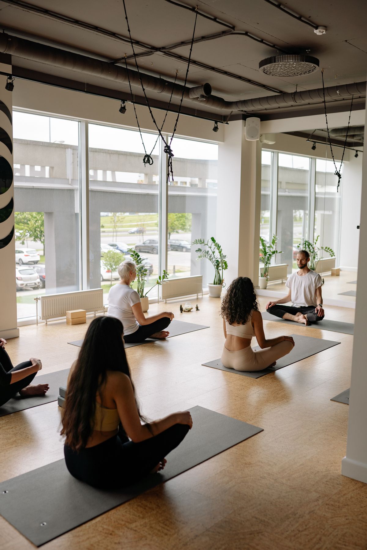 Concept imagery — a quiet yoga practice in soft light (sample photo)