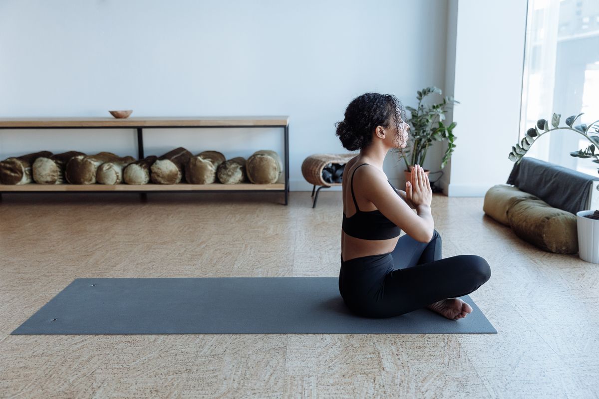 Soft morning light in a quiet yoga studio