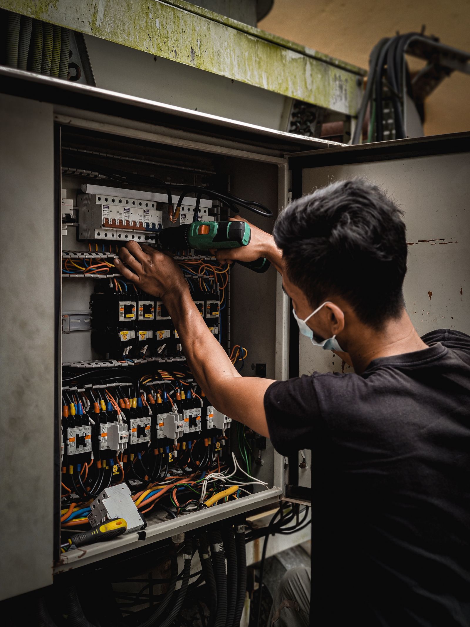 Electrician working on a residential switchboard
