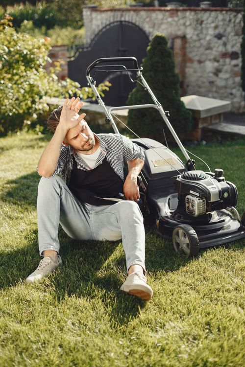 A homeowner resting beside his mower — the weekend VK gives back
