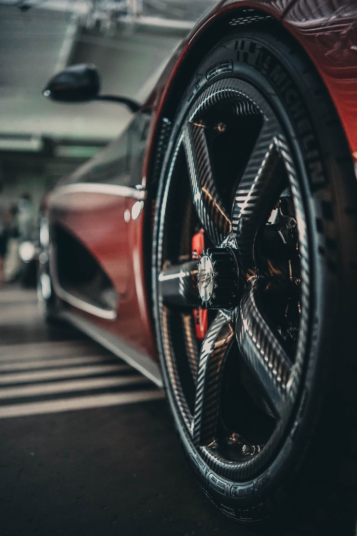 Close-up of a detailed alloy wheel and tire