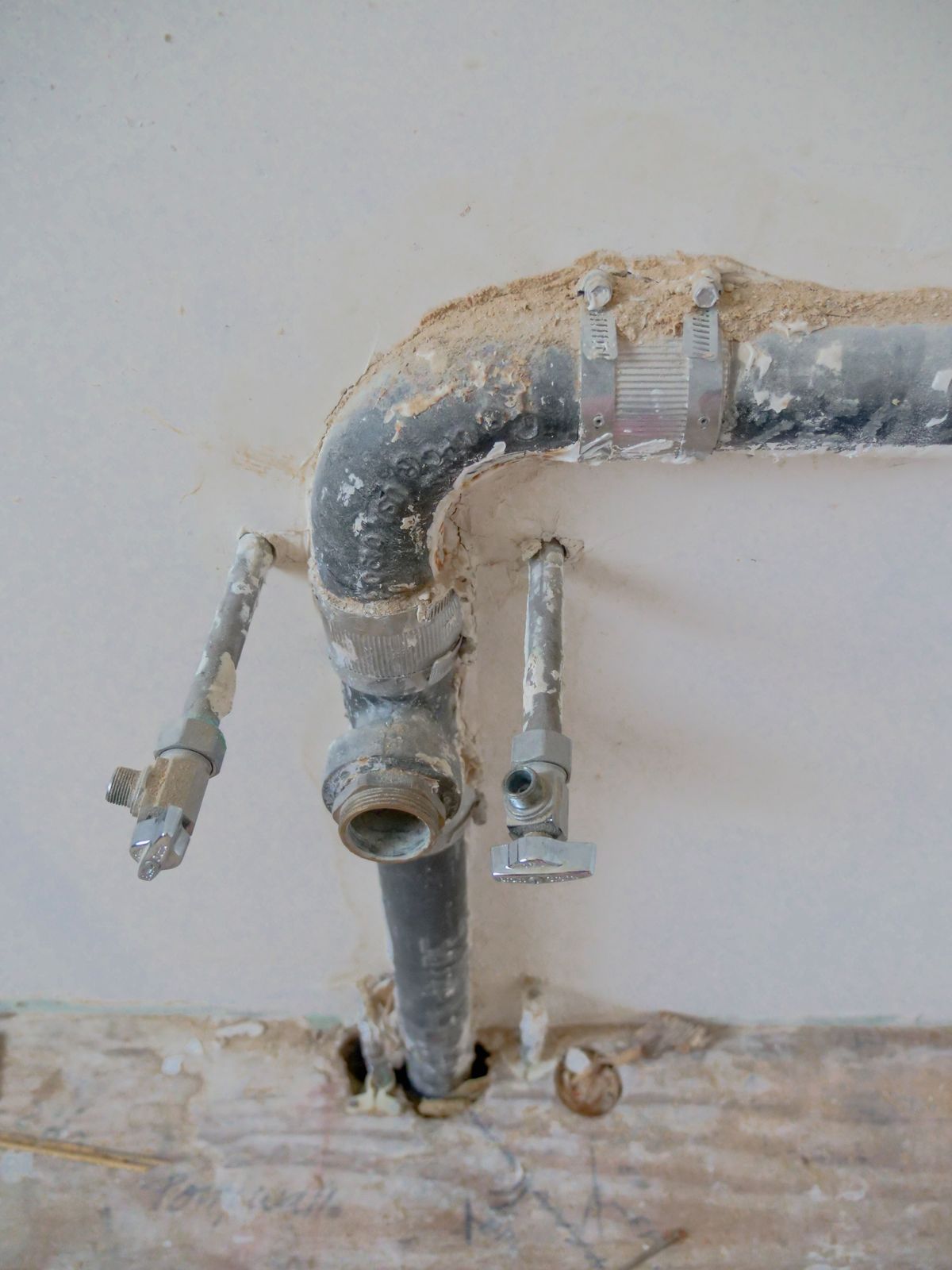 Plumber repairing a sink