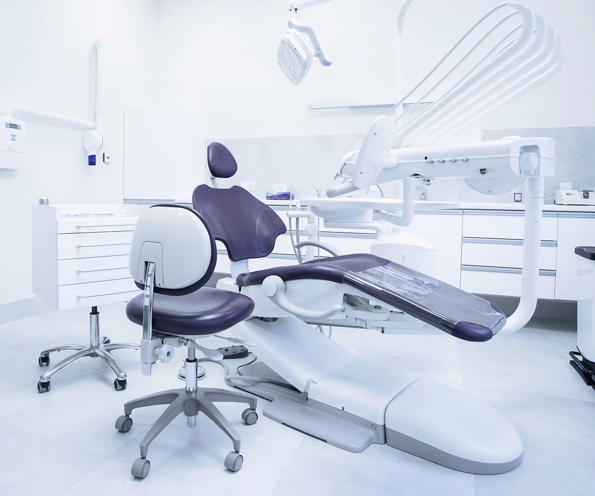 Dental chair in a bright office