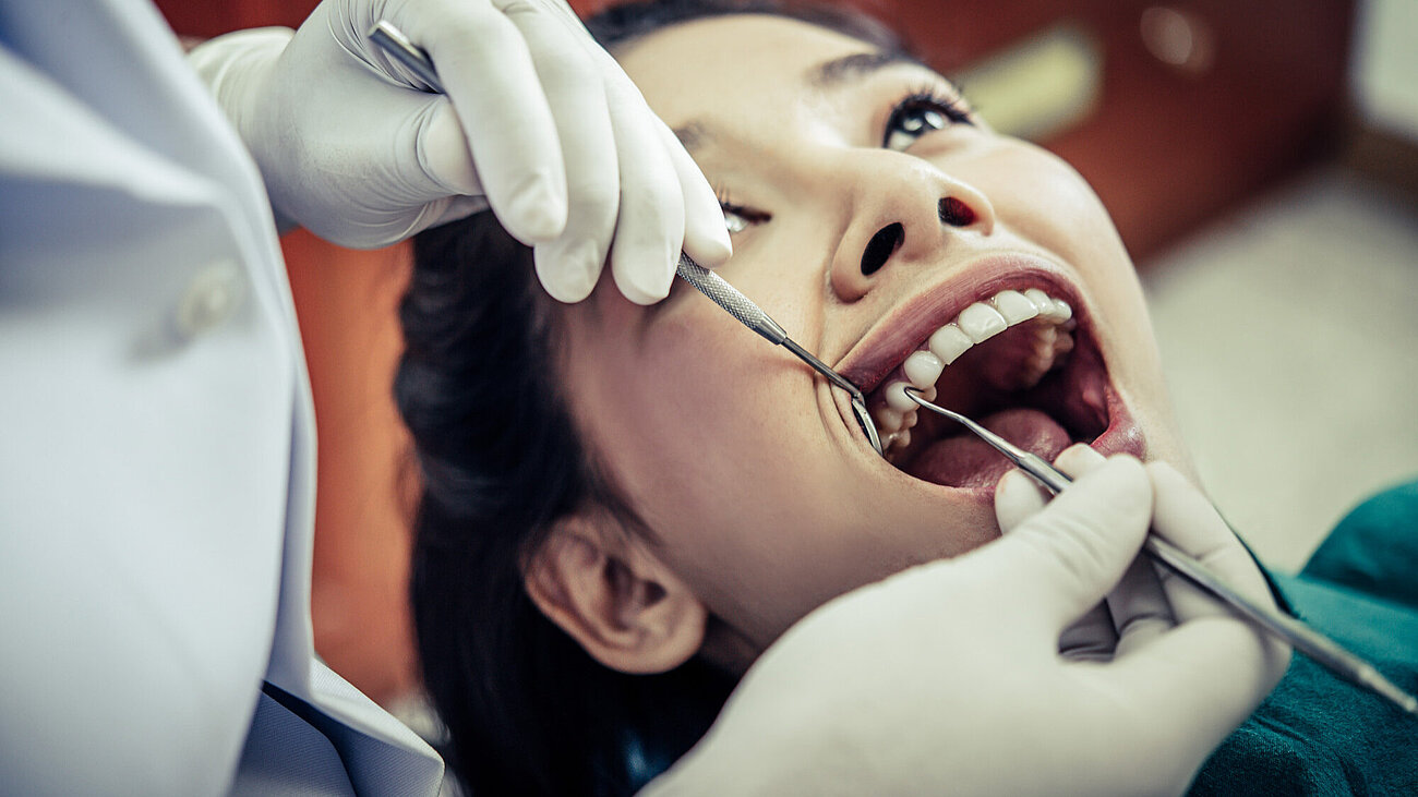 Dentist at work in the operatory