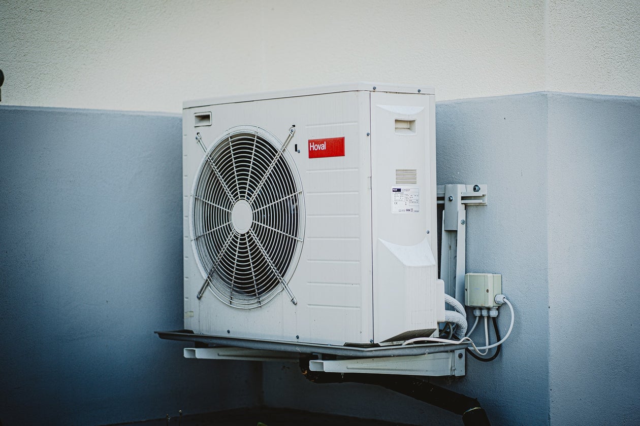 Wall-mounted outdoor heat pump unit